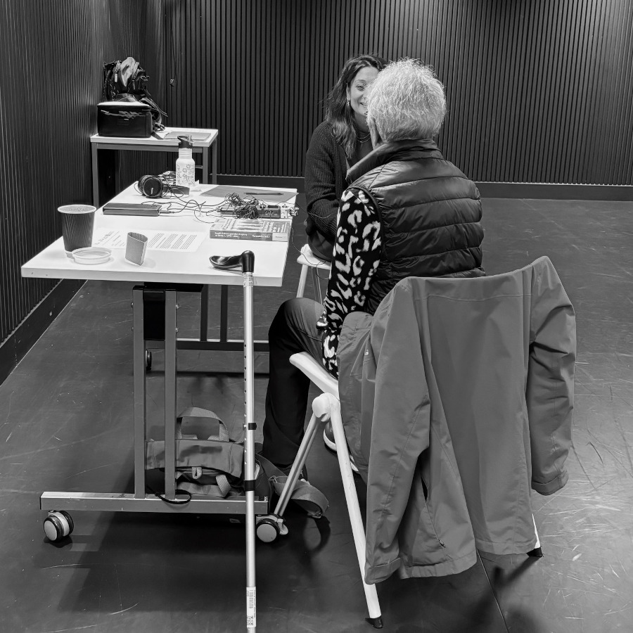 Researcher and subject in a recording room